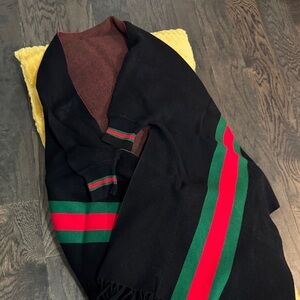 Stylish Black Sweater with Red and Green Stripes